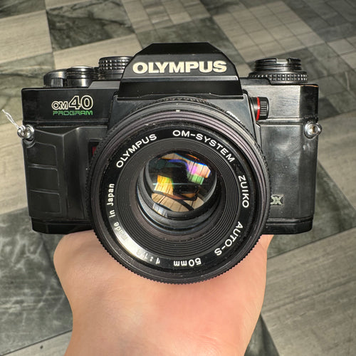 Olympus OM40 Program