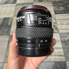 Load image into Gallery viewer, Tokina AF SD 28-70mm f/3.5-4.5 Lens